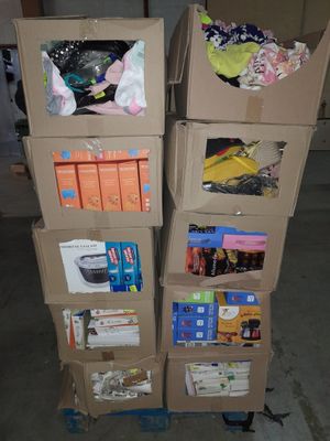 several cardboard boxes stacked on top of each other in a garage