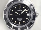 an image of a watch with a black face and a yellow second hand