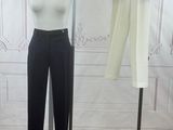 an image of a mannequin and pants on a stand
