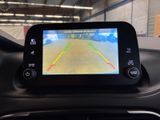 a picture of a car ' s rear view camera in the dash