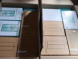 many boxes that are stacked on top of each other