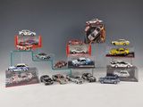 a lot of toy cars on display in a display case