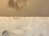 drawing of a woman laying on a bed next to a drawing of a man
