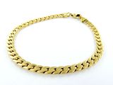un bracelet en or jaune à maillons de type « curb » sur fond blanc
