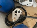 an image of a vacuum and other items on the floor