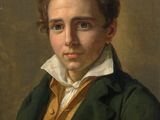 portrait of a young man in a green coat and white collar