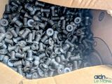 a box full of screws and nuts in it
