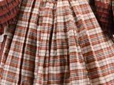 an image of a woman ' s plaid dress on a mannequin mannequin mannequin mannequin mannequin mannequin mannequin