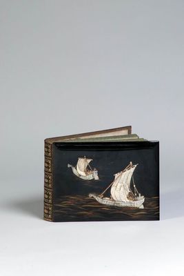 an image of a book with a picture of a boat on it