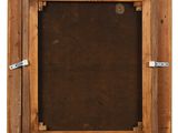 an old wooden picture frame with a black background and a brown background