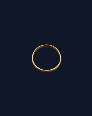 a gold ring on a dark blue background