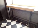 a black and white checkered floor in a kitchen
