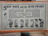snow white and the seven dwarfs in a box with a remote control