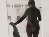 a picture of a woman in a bathing suit in a white frame