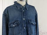 an image of a denim jacket on a mannequin dummy