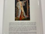 the back cover of a book with an image of a woman in a dress