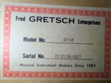 the label for a musical instrument maker ' s store shows the name of the instrument