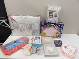 a lot of baby items on a table in the room