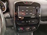 the dashboard of a car with a car radio in the center of it