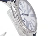 a close up of a wrist watch with roman numerals on it