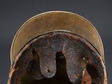 a close up of a helmet on a black background