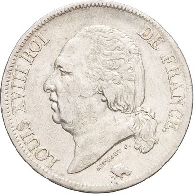 l'image d'une pièce d'argent sur laquelle figure le visage d'un homme