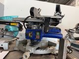a blue machine that is sitting on top of a table