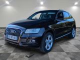 une image d'une audi suv noire garée dans un garage