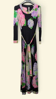black and multicolored floral print dress on hanger