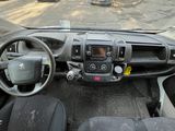 a view of the inside of a vehicle from the driver ' s seat