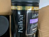 a container of hair products sitting in a cardboard box