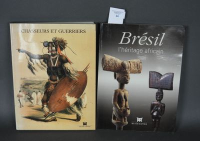 deux livres posés sur une table noire, avec la photo d'un homme à cheval