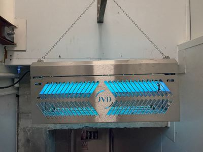 a blue light that is hanging from the ceiling