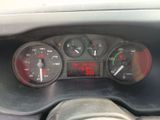 a close up of a car dashboard with a clock on it