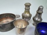 a lot of silver items sitting on a table