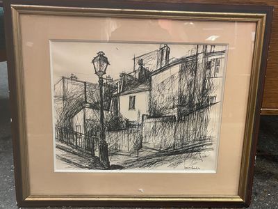 dessin représentant un lampadaire dans un cadre posé sur une table