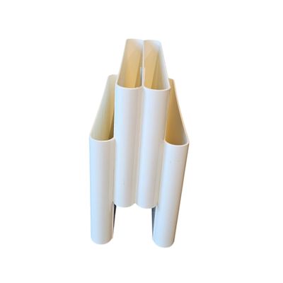 a white vase that has four different sections of it