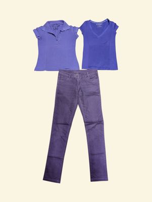 purple jeans and a blue shirt are sitting next to each other