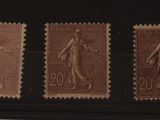 trois timbres représentant une femme et un homme