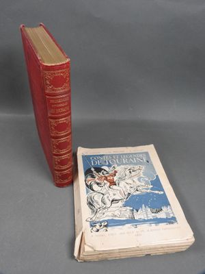 two books sitting on a table next to each other