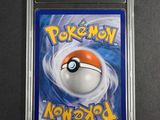 a close up of a nintendo game card with a pokemon ball on it
