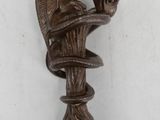 an image of a close up of a wooden object on a wall