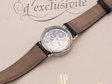 a watch that is sitting on top of a book