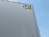 an image of a white refrigerator with a frc sticker on it
