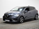 Une Toyota C-HR grise est garée sur un sol à damier