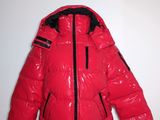 the jacket is red with black trims and a hood
