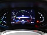 the dashboard of a car with a digital display showing the speed of the car