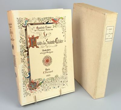an old book with a picture of a bird and a bird sitting on top of it