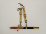 pair of antique brass and black pen and key hooks