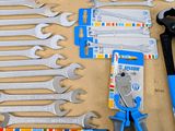 a lot of tools that are laying out on the table
